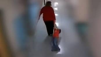 Kentucky teacher fired, pleads not guilty to assault after video emerges of autistic boy, 9, being dragged down hall