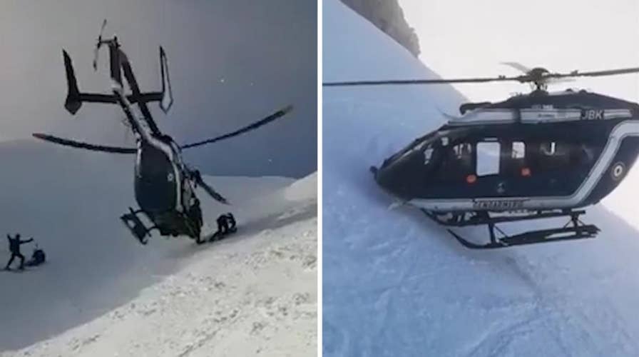 Helicopter pilot displays impressive skills in rescue of injured skier on French mountainside