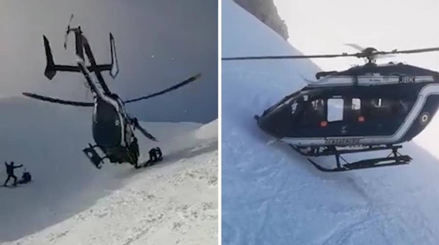 Helicopter pilot displays impressive skills in rescue of injured skier on French mountainside