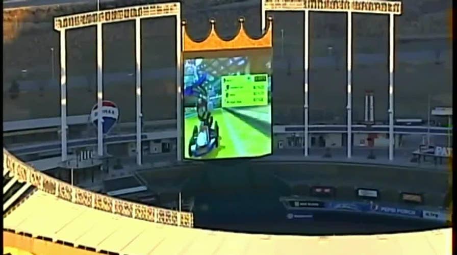 Helicopter captures video of Mario Kart being played on Kansas City Royals' stadium scoreboard