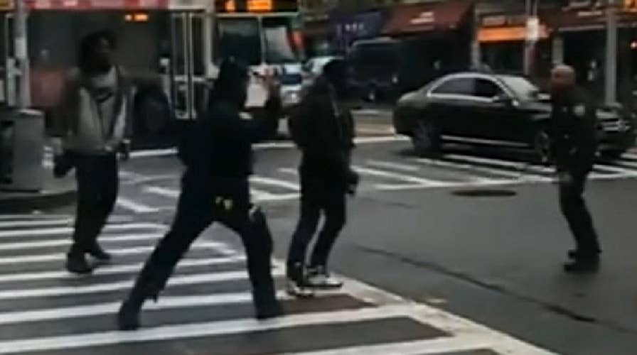 NYPD officers beat men with batons during violent altercation caught on camera