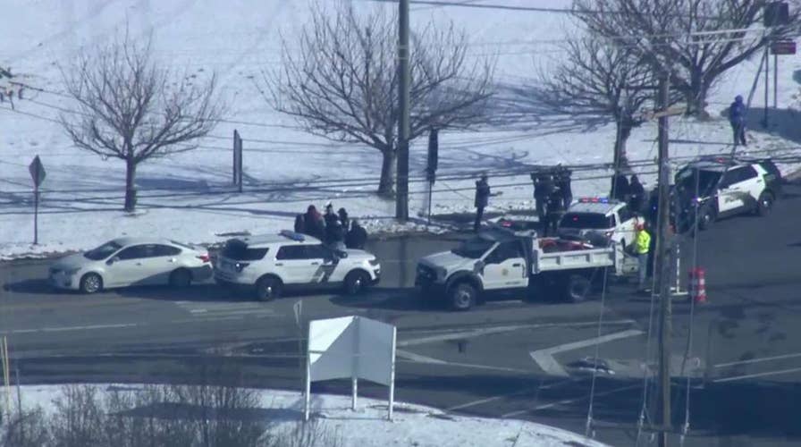 Police respond to hostage situation at UPS facility in Logan Township, New Jersey following reports of active shooter