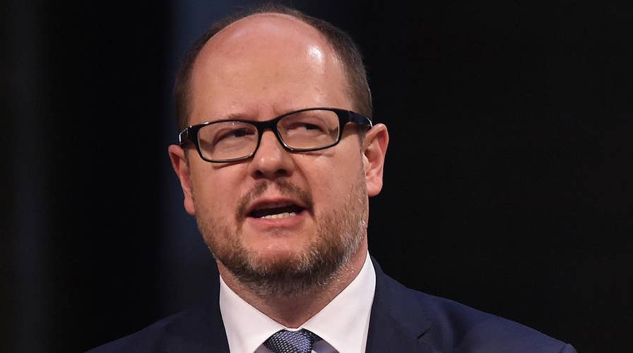 Officials: Polish mayor dies after being stabbed on stage by ex-convict during charity event
