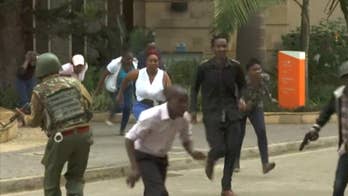 Gunfire rings out as people flee apparent terror attack at an upscale hotel in Kenya