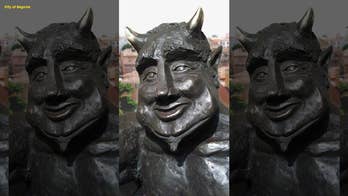 Selfie-snapping Satan sculpture sparks outrage in Spanish city because he is too happy