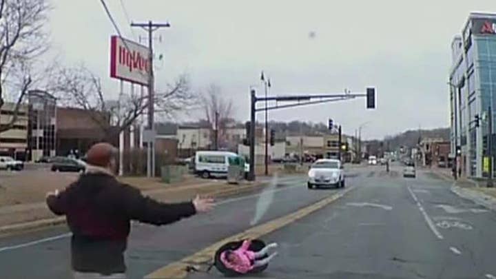 Toddler flies out of moving car while still strapped to car seat