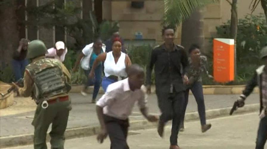 Gunfire rings out as people flee apparent terror attack at an upscale hotel in Kenya