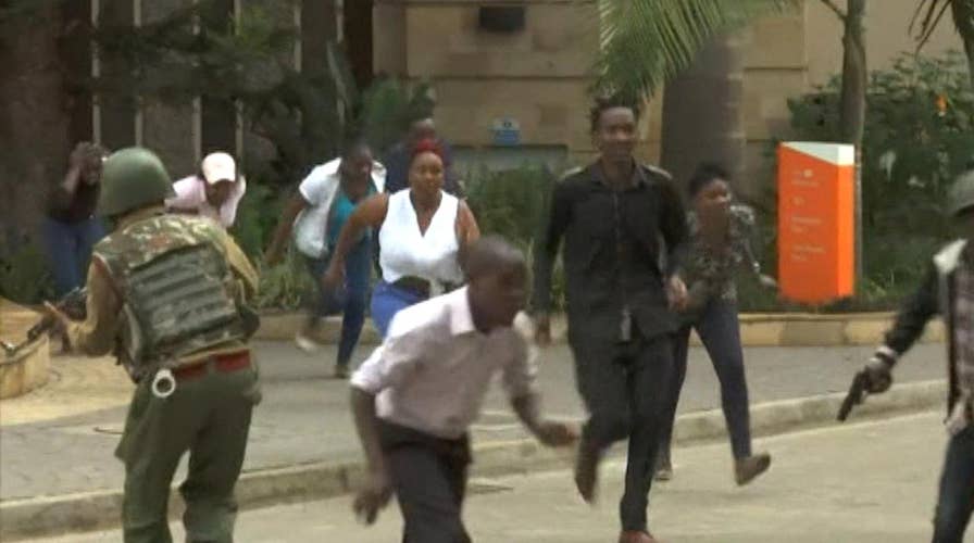 Gunfire rings out as people flee apparent terror attack at an upscale hotel in Kenya