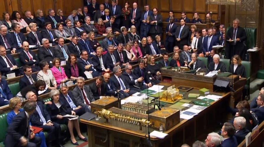 British lawmakers vote overwhelmingly to reject Prime Minister Theresa May's Brexit plan