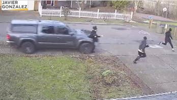 Fleeing pedestrians swiped by truck that sped onto sidewalk in video