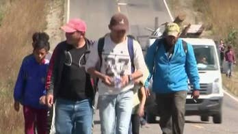 Caravan of Central American migrants crosses into Guatemala from Honduras