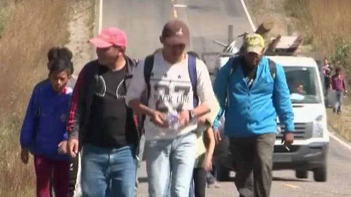 Caravan of Central American migrants crosses into Guatemala from Honduras