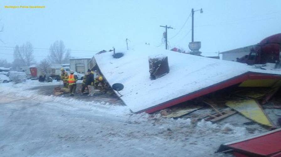 Truck crashes into restaurant, destroying the facility and injuring three people