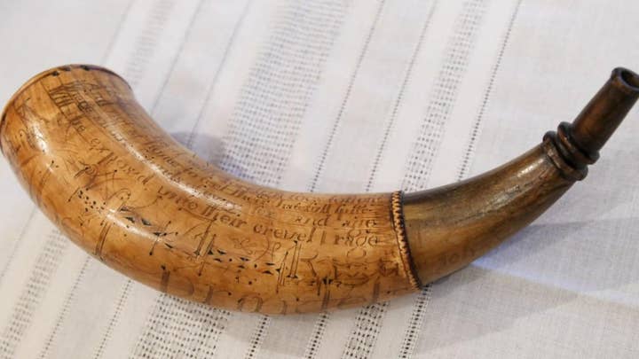 Revolutionary War powder horn returned to museum it was stolen from in 1952