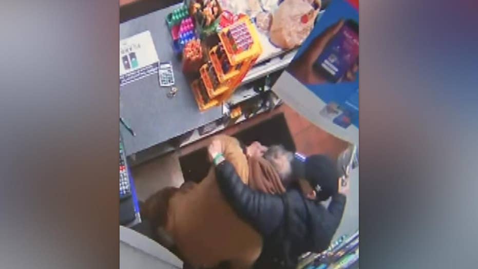 Store clerk violently attacked in armed robbery, suspects on the run: police
