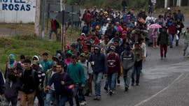 Thousands of caravan migrants in limbo awaiting Mexico asylum