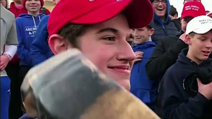 Different angle of video of Catholic high school students and Native American shows the man approached them