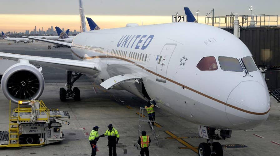 Passengers trapped for hours on runway at freezing airport after medical emergency diverts flight