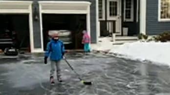 Massachusetts family turns icy driveway into hockey rink