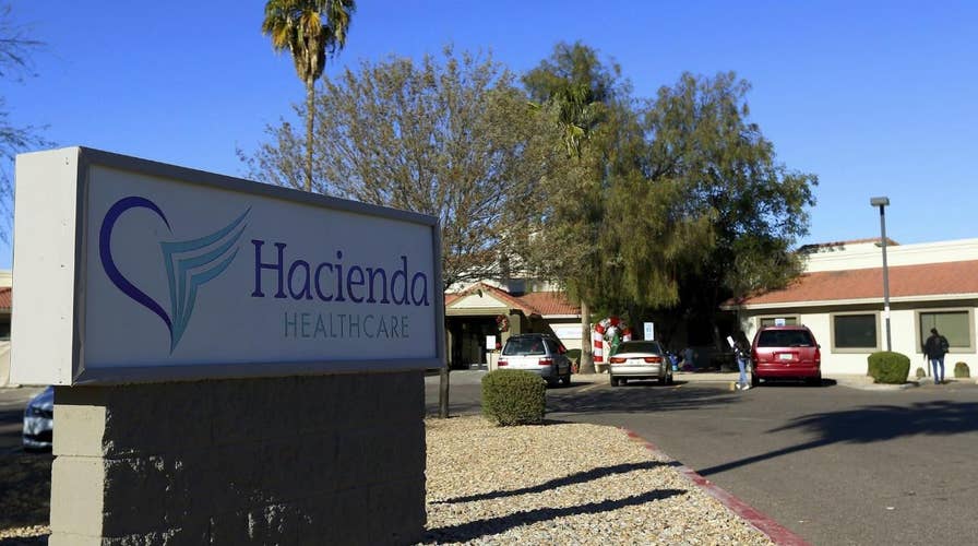 Two doctors leave the Hacienda HealthCare facility where a patient in an incapacitated state gave birth