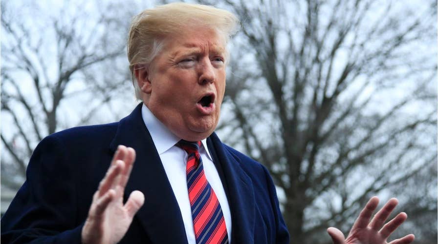 Trump unveils new slogan for border wall