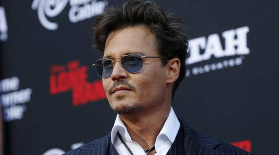 Johnny Depp fights back; big names missing from Oscar nominations