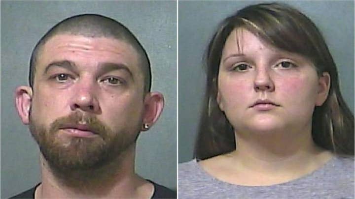 Parents arrested for splitting 14-month-old son's tongue with scissors, officials say