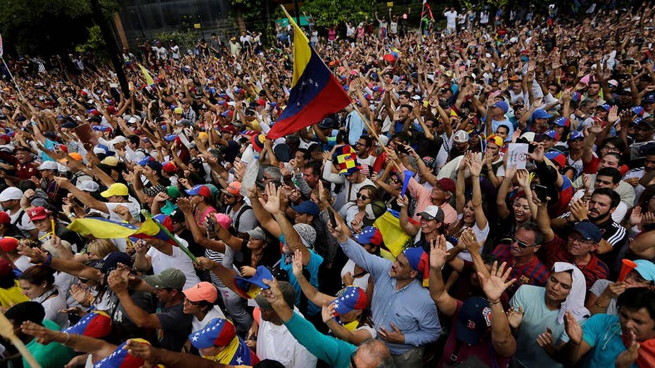 Venezuela’s interim president Guaido offers Maduro amnesty if he cedes power