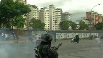 Venezuela allows US diplomats to stay, defusing showdown, as crisis continues