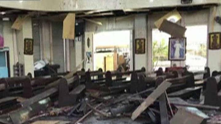 At least 20 dead, dozens injured following bomb attack inside a church in the Philippines