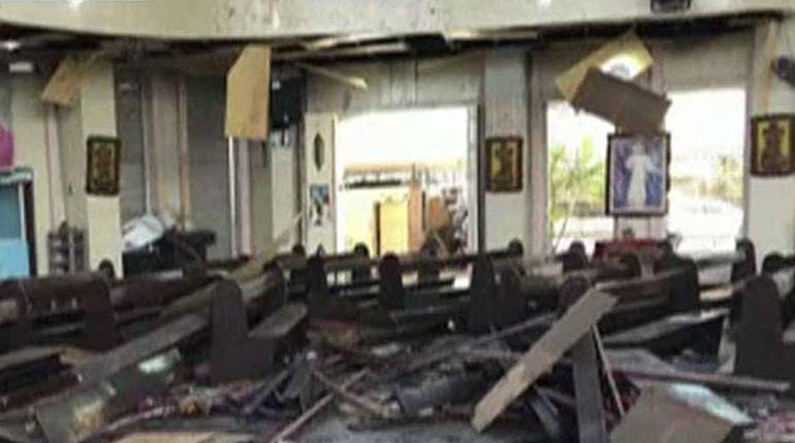At least 20 dead, 70 injured following bomb attack inside a church in the Philippines