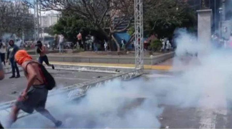 What will Russia risk in order to protect ousted Venezuelan President Maduro?