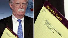 John Bolton's written note on 'troops to Colombia' raises eyebrows