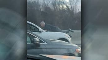 Massachusetts man, 65, clings to hood of SUV on turnpike in suspected road-rage incident