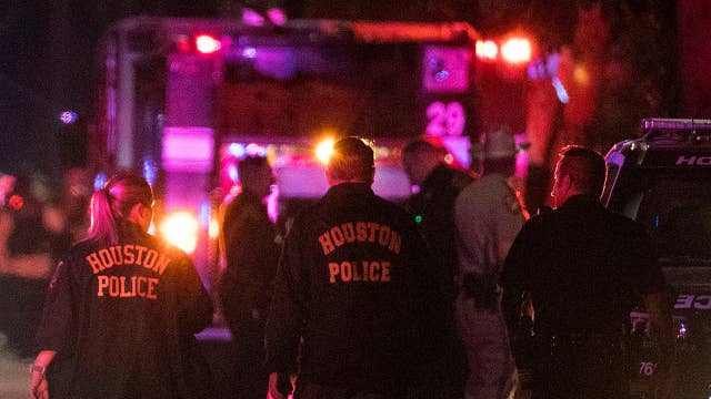 Four police officers shot and two suspects killed in Houston, Texas