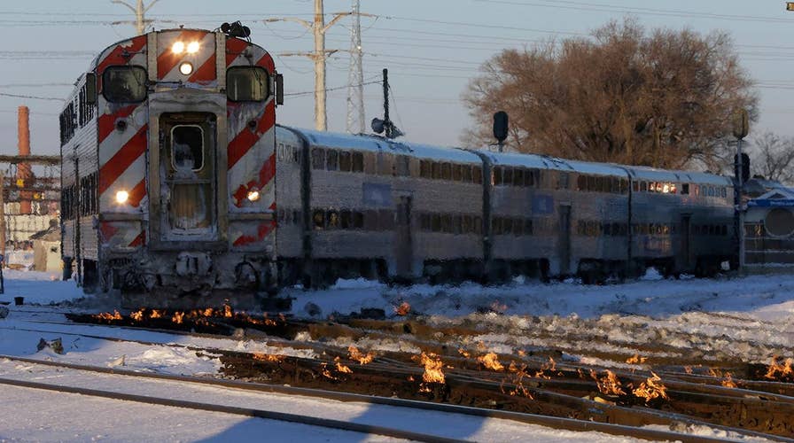 Chicago rail operators lighting tracks on fire to battle record-breaking cold