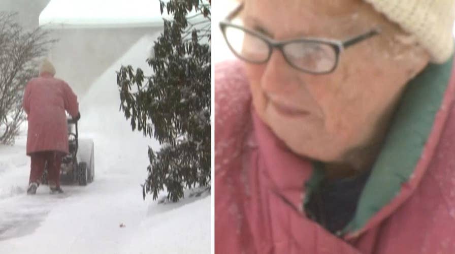 'Snow blowing granny' goes viral for braving subzero temperatures to clear driveway