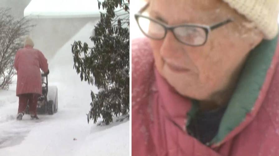'Snow blowing granny' goes viral for braving subzero temperatures to clear driveway