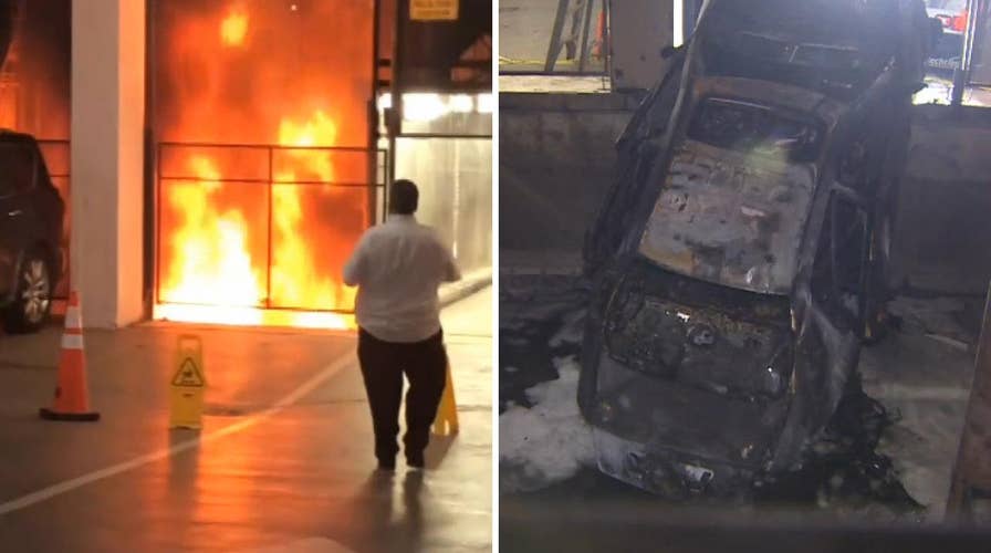 Car plummets nine floors, bursts into flames in downtown Miami parking garage