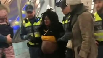 Pregnant woman dragged off subway train by Swedish guards sparks outrage, backlash