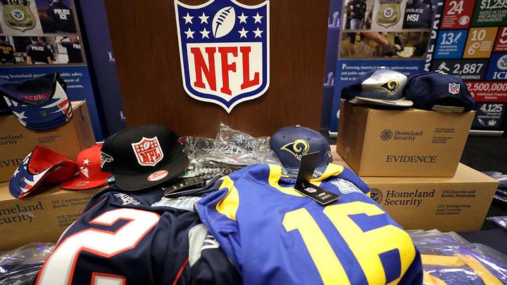 NFL officials warn football fans to watch out for counterfeit Super Bowl tickets, merchandise