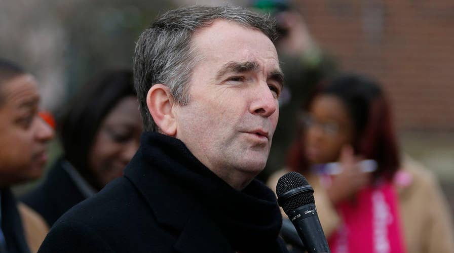 Virginia Governor Ralph Northam faces questions about racist yearbook photo