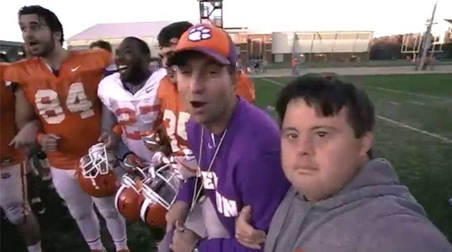 Clemson’s Dabo Swinney gifts Super Bowl tickets to team member with Down Syndrome