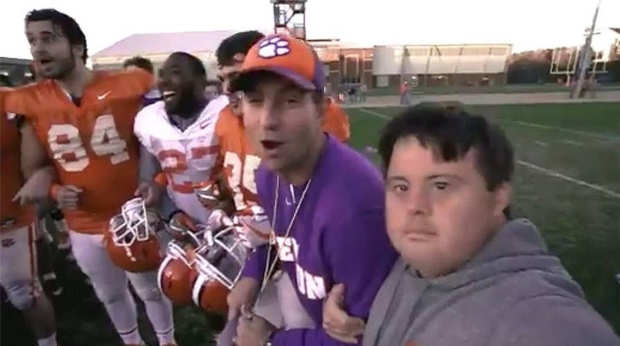 Clemson’s Dabo Swinney gifts Super Bowl tickets to team member with Down Syndrome