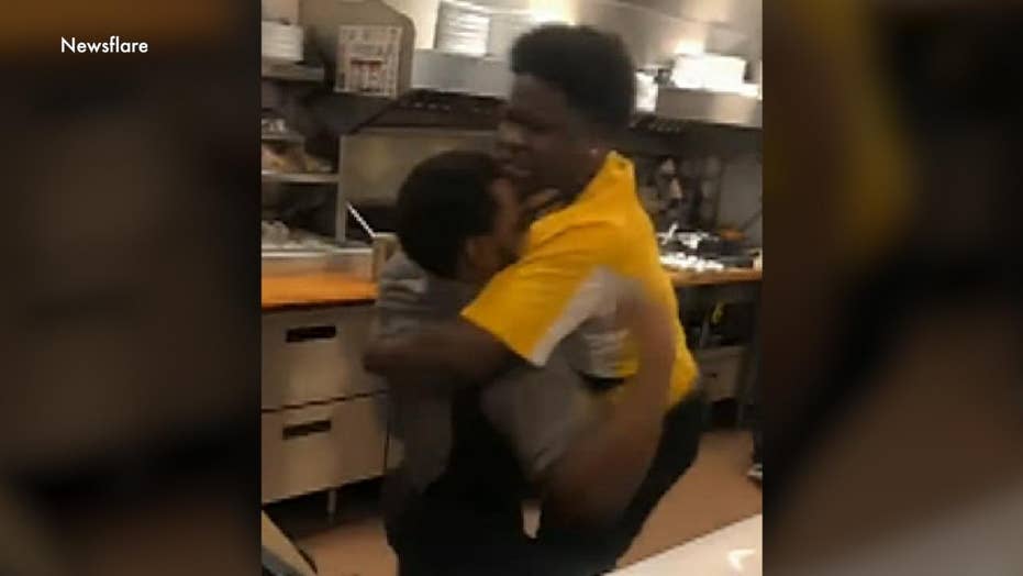 Waffle House employee brandishes knives during fight with fellow employee, video shows