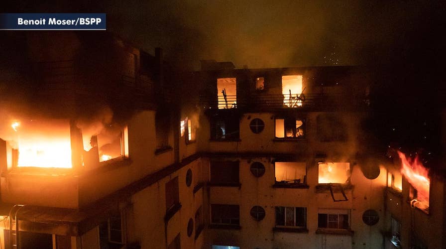 Suspect in custody following deadly apartment building fire in Paris