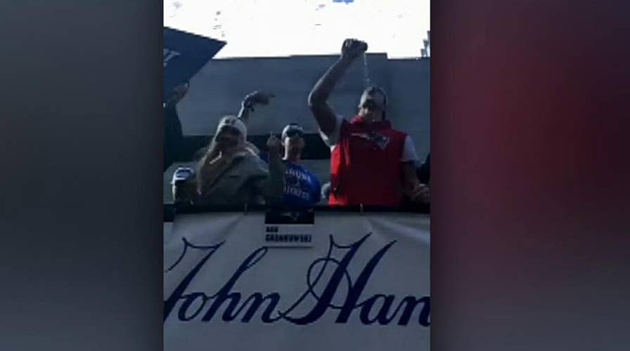 Patriot Rob Gronkowski chugs beer at Super Bowl parade