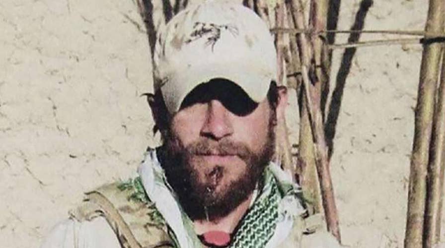 Judge drops 2 charges against decorated Navy SEAL facing war crimes prosecution