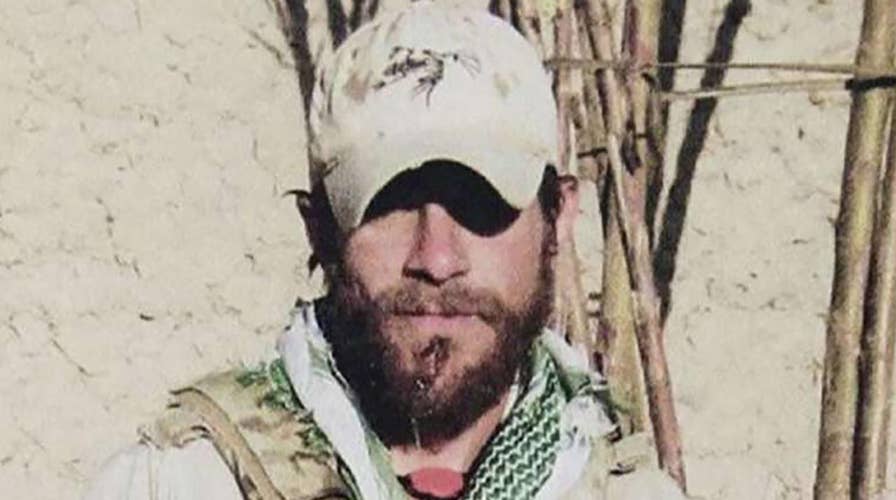 Judge drops 2 charges against decorated Navy SEAL facing war crimes prosecution