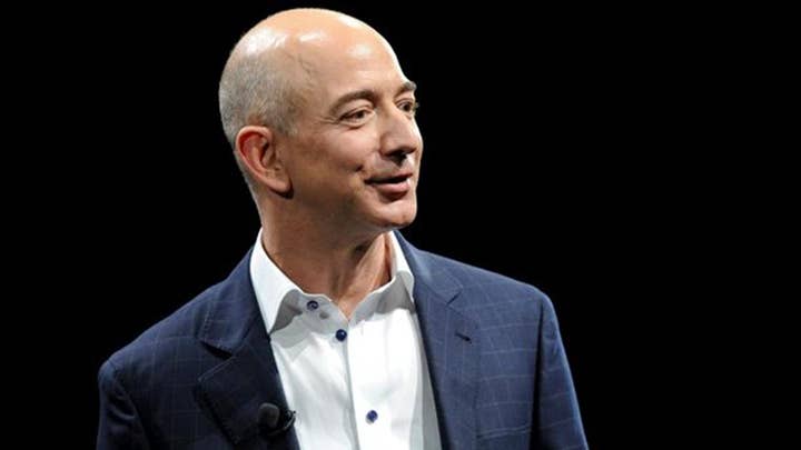 Jeff Bezos accuses National Enquirer's publisher of blackmail and extortion